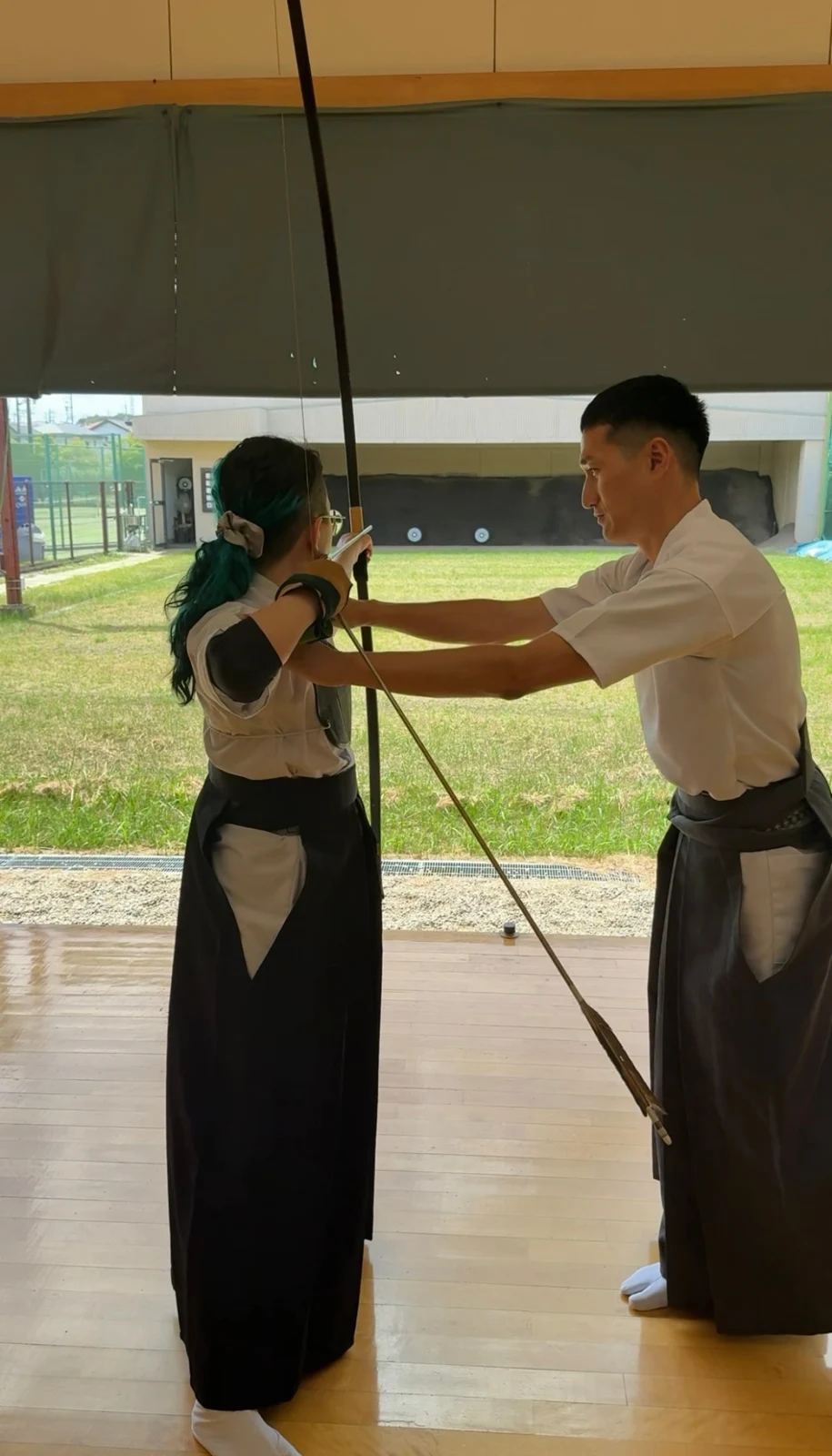 Personal kyudo instruction in a dojo